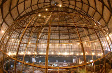 
                    The steel frame of the old plaster planetarium dome right before it was removed, February 2003.
                                            (Griffith Observatory)
                                        