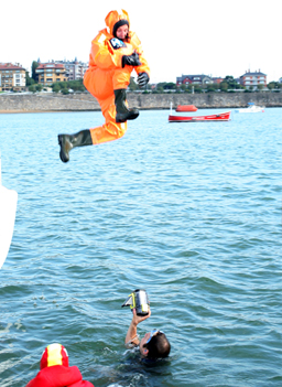 
                    Tim Troy jumps into the sea during sea survival training at Porto Deportivo in Getxo, Spain.
                                            (onEdition)
                                        