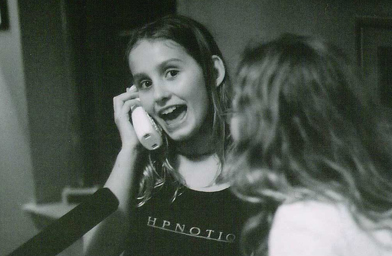 
                    Nora attempts to prank call the boys.
                                            (Maureen Wellner)
                                        