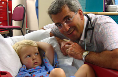 
                    Dr. Michael Teodori of Phoenix Children's Hospital with Julia Barton's son Zach.
                                            (Joshua Sarantitis)
                                        
