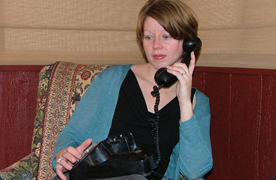 
                    Christina Wall talks on the rotary phone, something she did a lot of during her experiment.
                                            (Christina Wall)
                                        