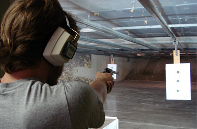 
                    Nick van der Kolk aiming at a paper target at Bob's Tactical Indoor Shooting Range and Gun Shop in Salisbury, MA.
                                            (Tim Terway)
                                        