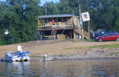 
                    The Boat Tavern is the home of the Redneck Fishing Tournament, where 3,000 people are expected to watch four separate heats where fishermen net the dreaded Asian silverhead carp.
                                            (Kelly McEvers)
                                        