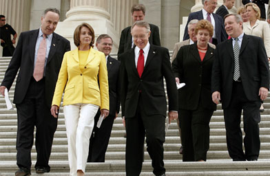 
                    Democrats discuss the 109th Congress before the August recess on the steps of the U.S. Capitol in July.
                                            (Chip Somodevilla / Getty Images)
                                        