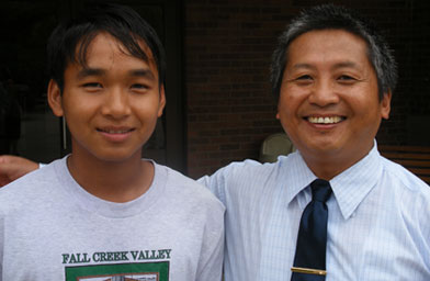 
                    Thlasui (Sui) Tluangneh with his son Ro after Sunday services at the Indiana Chin Baptist Church.
                                            (Kara Oehler)
                                        