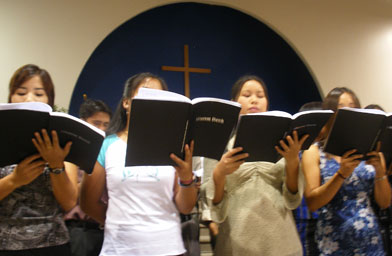 
                    Members of the Indiana Chin Baptist choir sing during Sunday worship services.
                                            (Kara Oehler)
                                        