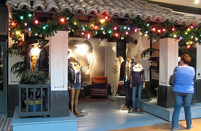 
                    The unusual entrance to Hollister doesn't allow you to see into the store. There are no signs to advertise sales. In fact, the only place the Hollister name appears is on a single surfboard in the corner.
                                            (Ochen Kaylan)
                                        