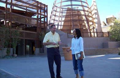 
                    Weekend America host Desiree Cooper and Marcel Parent, a director at the Springs Preserve, in front of the entrance to the Springs Preserve.
                                            (Marc Sanchez)
                                        
