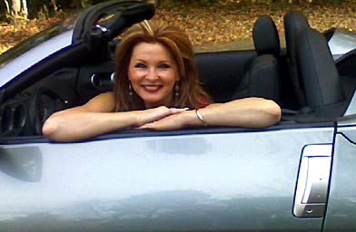 
                    Roz Bertone in her "rocketship." She purchased a sportscar this past summer and now realizes that it was a want and not a need.
                                            (: Roz Bertone)
                                        