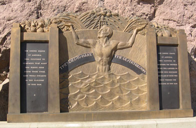 
                    A memorial to the approximately 100 dam workers that died while building the dam.  In the lower left corner of the bas-relief, there is a small figure of a body floating down stream.
                                            (Krissy Clark)
                                        