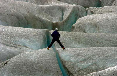 
                    Weigel stands over a crevasse on the Mendenhall Glacier.
                                            (Beth Weigel)
                                        