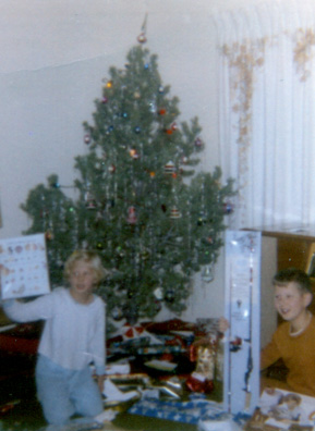 
                    Christmas 1969, when the Wallaces lived in Colorado Springs, Colorado. Chela is on the left and her oldest brother, Greg, is on the right.
                                            (Chela Wallace)
                                        