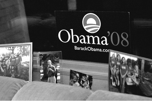 
                    Gracia and Jim Willis have a collection of Obama political artifacts and family photographs on the windowsill in their living room.
                                            (Sarah Mercier)
                                        