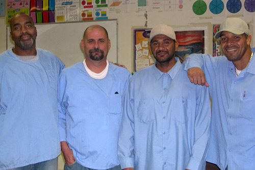 
                    Inmates at Pleasant Valley State Prison in Coalinga.  All four men have life sentences.  Coalinga became one of the fastest growing cities in California when the town decided to annex the prison, and count inmates as new residents.
                                            (Krissy Clark)
                                        