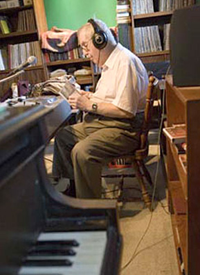 
                    Dougherty during what he thought was the last broadcast of his jazz show on WSUI
                                            (Sarah Mercier)
                                        