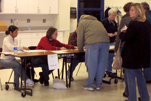 
                    Everyone lines up to sign in and get their check mark at Iowa City Democratic Precinct 6.
                                            (Kyle Gassiott)
                                        