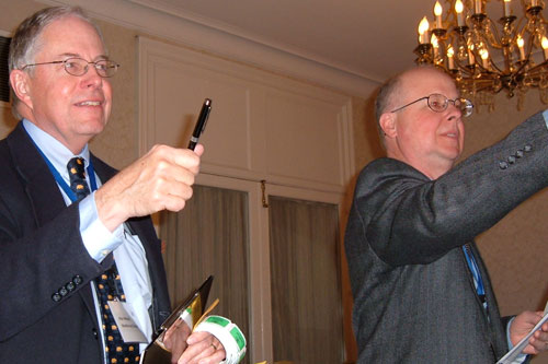 
                    Allan Metcalf (left) and Wayne Glowka count more votes.
                                            (Blair Chavis)
                                        