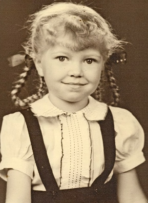 
                    Lucinda Alsobrook Coulter-Burbach in pigtails circa 1942.
                                            (Courtesy Lucinda Alsobrook Coulter-Burbach)
                                        