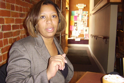 
                    Candye Hinton takes a break from her real estate practice for a cup of coffee at Uptown Coffeehouse in Howell. Hinton is the only black realtor in Livingston County, Mich. This month, she became the first African American president of the Livingston Diversity Council.
                                            (Desiree Cooper)
                                        