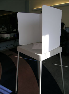 
                    A Pollstar voting booth on display in the lobby of the Cuyahoga County Board of Elections. Voters in Ohio's most populous county will fill in bubbles on ballots in booths like this one during the March 4, 2008 primary election.
                                            (Mhari Saito)
                                        