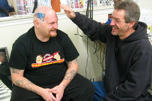 
                    Tattoo artist Gary Laroche says Thompson's is not the first head he's inked. He admits that underneath his hair, he too has a tattoo on his head.
                                            (Shannon Mullen)
                                        