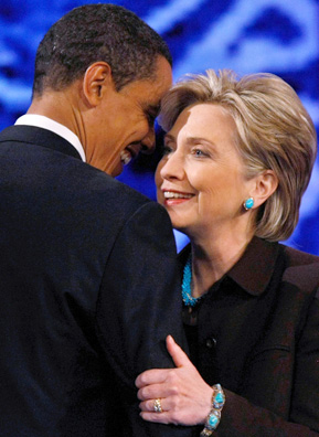 
                    Democratic senators and presidential hopefuls Barack Obama and Hillary Clinton embrace after the Democratic Primary debate held at the Kodak Theatre on January 31st in Los Angeles, California.
                                            (David McNew/Getty Images)
                                        