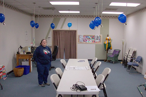 
                    Mary Retallick is the office manager at headquarters. The balloons have been added to make things happier.
                                            (John Moe)
                                        