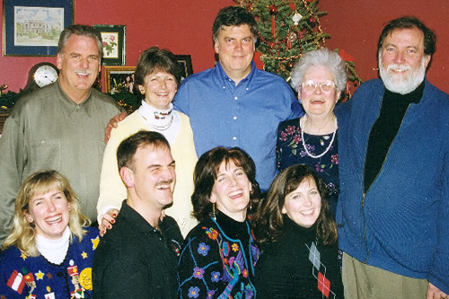 
                    Marie McNulty and brood during Christmastime 1998 (top left to right): Kevin, Ann, Bryan, Marie, Tim. Bottom left to right: Maureen, Pat, Eileen and Colleen.
                                            (Courtesy Maureen Saxton)
                                        