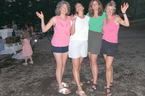 
                    The McNulty sisters are sweaty after their turn to cook during a family reunion camping trip in August 2006. From left to right: Ann, Colleen, Eileen and Maureen.
                                            (Courtesy Maureen Saxton)
                                        