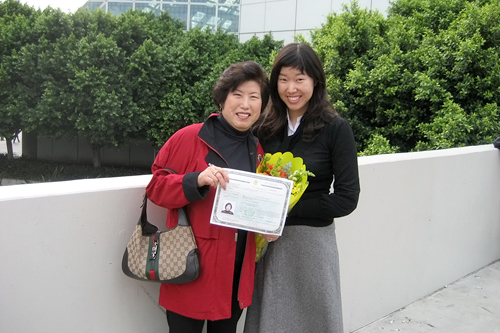 
                    Angela Kim with her mother outside the Los Angeles Convention Center after the citizenship ceremony.
                                            (Courtesy Angela Kim)
                                        