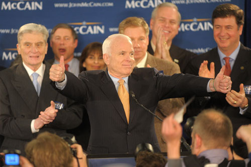 
                    Republican presidential hopeful Sen. John McCain celebrates Feb. 12, 2008 in Alexandria, Va., after sweeping rival Mike Huckabee in the Maryland, DC and Virginia primaries.
                                            (Tim Sloan/AFP/Getty Images)
                                        