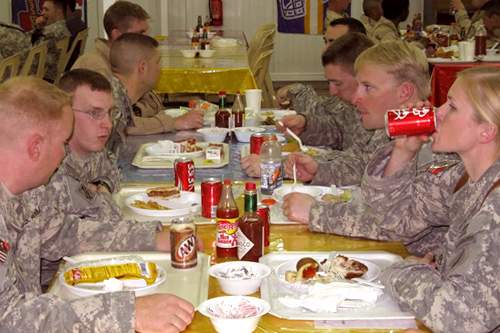 
                    A group of Missouri reservists at the Camp Ramadi dining facility or "D-Fac."
                                            (Adam Allington)
                                        