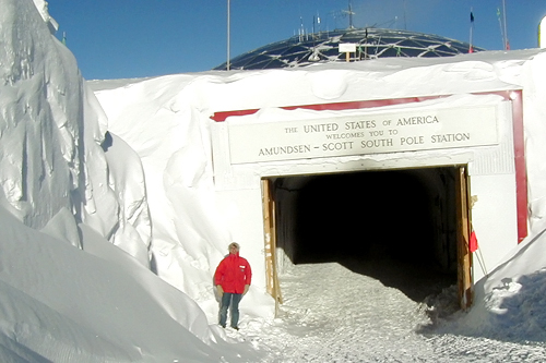 
                    Tift at the entrance to the Amundsen-Scott South Pole Center.
                                            (Nathan Tift)
                                        