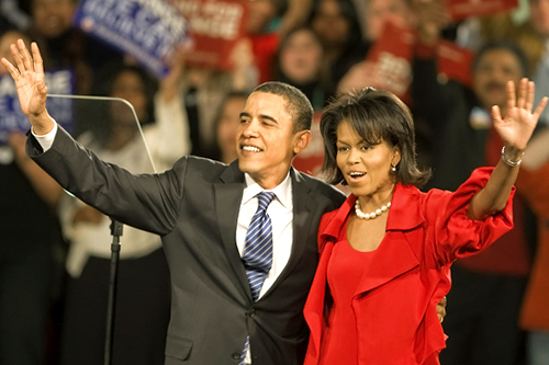 
                    Presidential hopeful and Illinois Senator Barack Obama and wife Michelle wave to the crowd on Super Tuesday in Chicago.
                                            (Paul J. Richards/AFP/Getty)
                                        