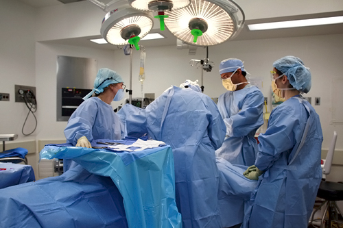 
                    Dr. Atul Gawande and his team in the operating room.
                                            (Laura Hanafin)
                                        