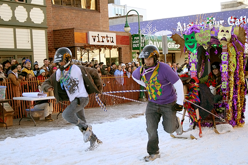 
                    Winner of both the People's Choice and Most Colorful awards, Moose Lodge's Mardi Gras team makes safety a priority as they sprint down Anchorage's Fourth Avenue wearing helmets.
                                            (Photo Credit: Anchorage Convention &Visitors Bureau/Cady Lister)
                                        