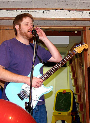 
                    Guitarist Steve Chicken rehearses.
                                            (Scott Wooster)
                                        