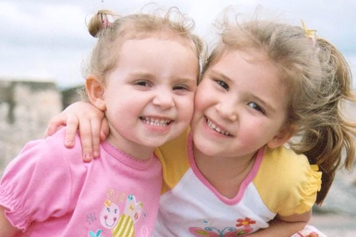 
                    Lillian (right), in the month she turned four with sister Charlotte in 2007.
                                            (Courtesy Scot Case)
                                        