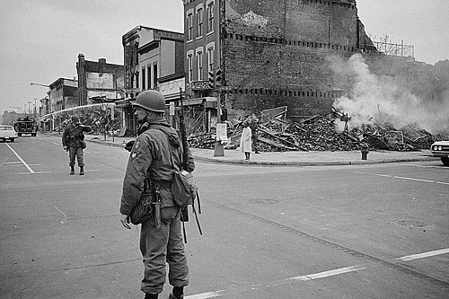 
                    Troops secure a corner in Washington, D.C., ravaged by rioting after the assassination of the Rev. Martin Luther King, Jr.
                                            (Library of Congress)
                                        