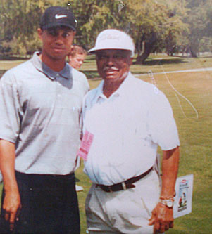
                    Long before Tiger Woods revolutionized the game of golf, Al Duhon was helping to break racial barriers. The 1982 U.S. Senior Amateur champion often teaches at Woods' golf clinics.
                                            (Charlie Schroeder)
                                        