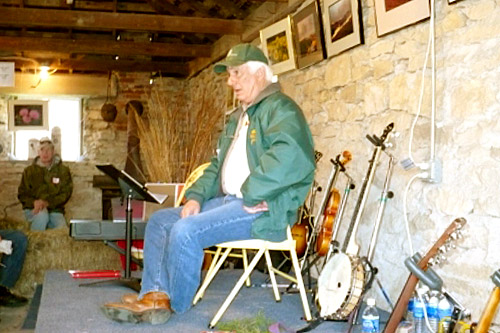 
                    Jan Jantzen talks to guests gathered in the barn for history, science and safety lessons before the burn.
                                            (Sylvia Gross)
                                        