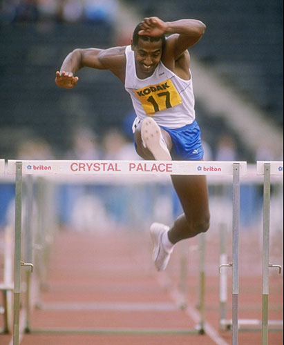 
                    Renaldo Nehemiah jumps a hurdle during a competition in 1987.
                                            (Bob Martin/Allsport/Getty Images)
                                        