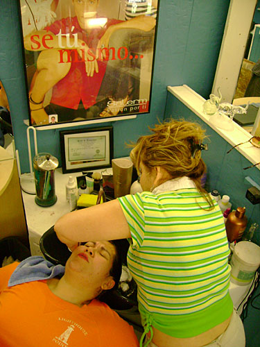 
                    Lilian Aguirre cuts hair at Nashville's International Hair Salon.
                                            (Will Pedigo)
                                        