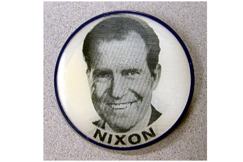 
                    This view of the holographic campaign pin shows Nixon's face.
                                            (Courtesy Hudson Library & Historical Society)
                                        