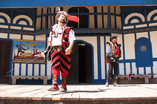 
                    Doug Kondziolka (left), aka Miguel, and Jose Granados, aka Don Juan, perform in "The Don Juan and Miguel Show", a fixture of the Dallas' Scarborough Faire Renaissance Fair for 24 years.
                                            (Julia Barton)
                                        