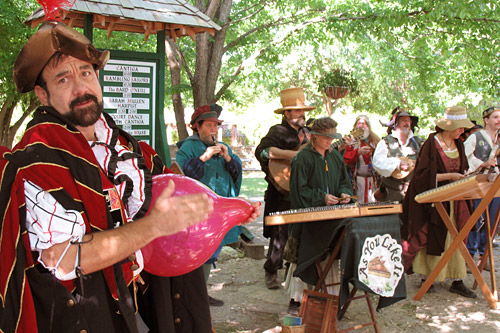 
                    Kondziolka plays his "bladivarius" -- a balloon and a wetted finger -- in character as Miguel at the opening of Scarborough Faire.
                                            (Julia Barton)
                                        