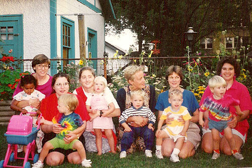 
                    Nanci Olesen (third from right), holding a 1-year-old Henry at a garden party in 1992.
                                            (Nanci Olesen)
                                        