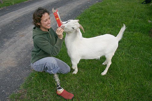 
                    Jenny Brown with Albie the goat. Brown lost her right leg to bone cancer as a child. Albie lost one of his legs due to an infection. "I have a special bond with (Albie)," she says. "It's like he and I against the world, and nothing's gonna stop us."
                                            (Christina Russo)
                                        