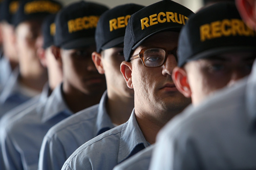 
                    U.S. Navy recruits stand at attention during training at The Great Lakes Recruit Training Command in North Chicago, Illinois. More than 40,000 recruits complete eight weeks of training at the facility every year. The base, which opened in 1911, was the first and is the only remaining U.S. Navy boot camp.
                                            (Scott Olson/Getty Images)
                                        