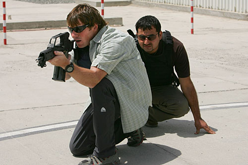 
                    Private security contractor Steve Cameron trains an Afghan operative at the ArmorGroup Close Protection base in Kabul, August 2007. London-based ArmorGroup is one of the largest private security companies working in Afghanistan.
                                            (Paula Bronstein/Getty Images)
                                        